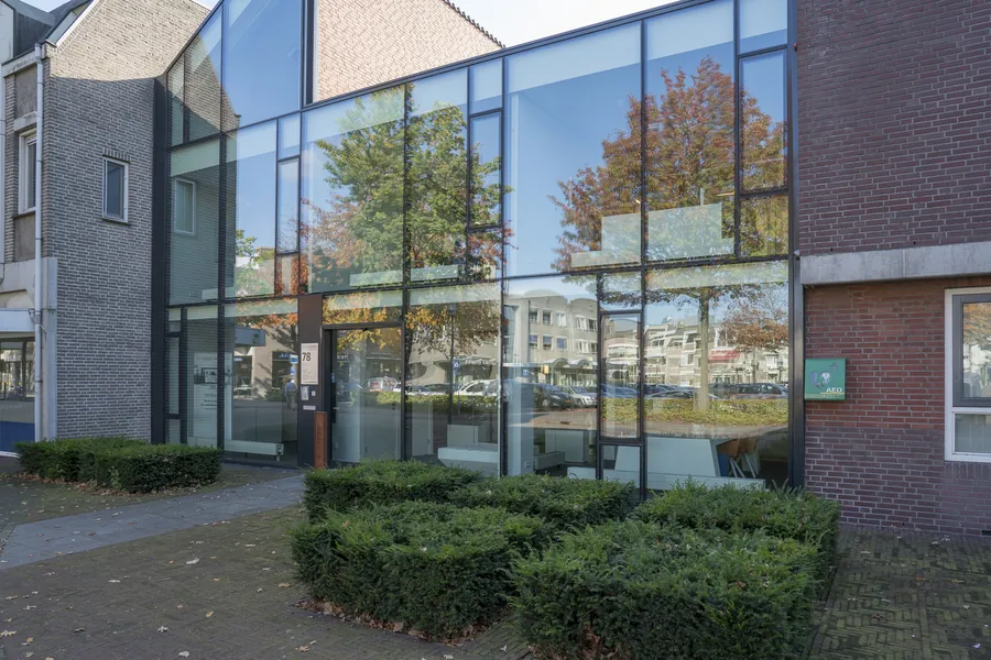 Gevel van Woningstichting Helpt Elkander
